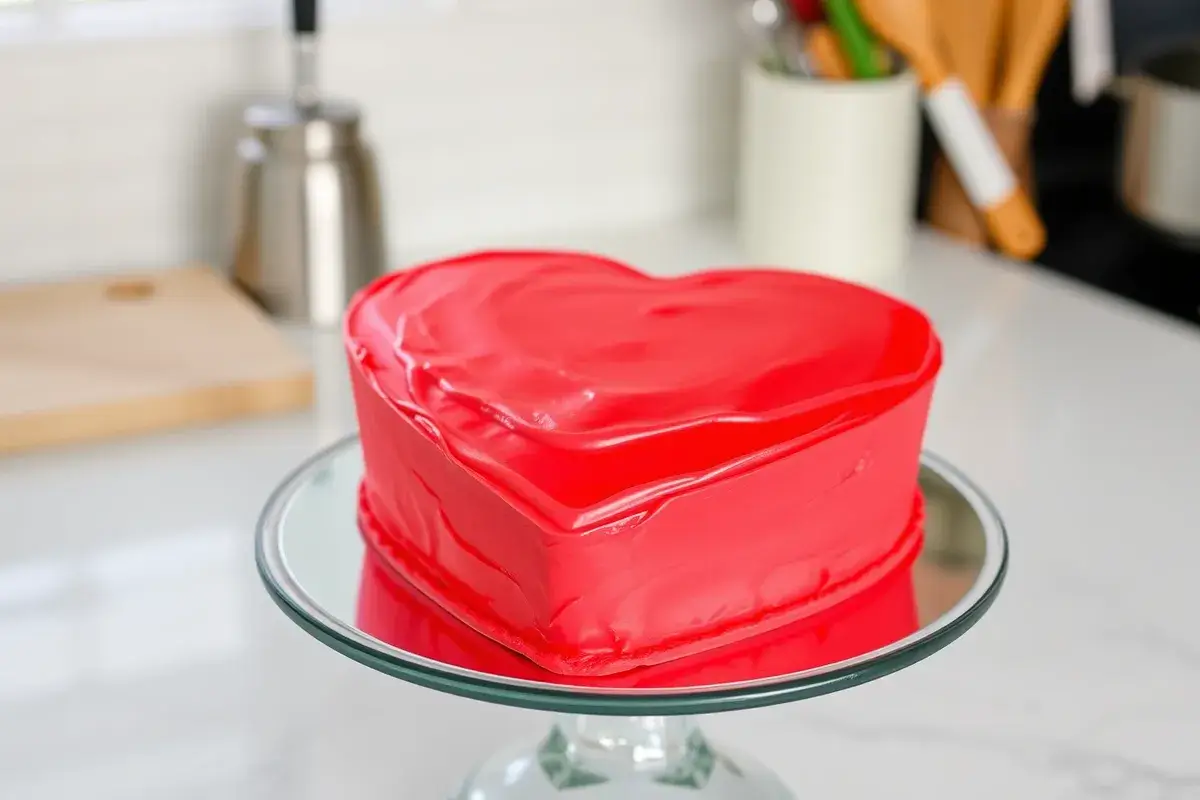 Does Costco make heart shaped cakes? A carved heart shaped cake on a stand